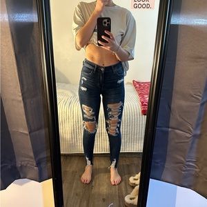 Size 0 dark wash extra stretchy American eagle ripped jeans